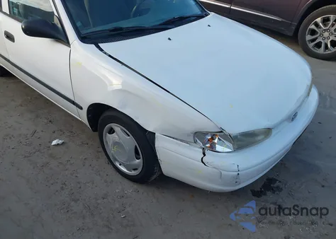 2001 Chevrolet Prizm from USA, damaged, VIN 1Y1SK52821Z419740